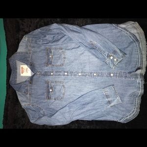 Denim button up shirt.
